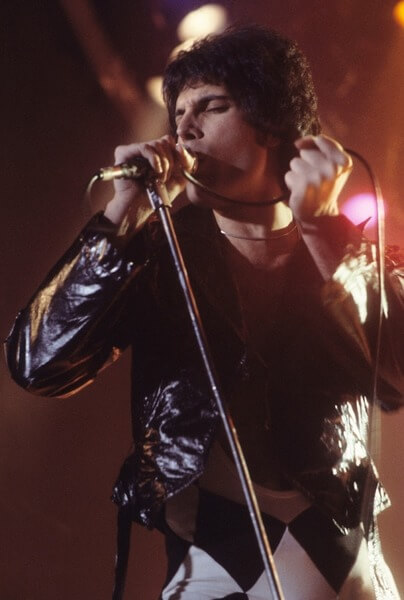 Freddie Mercury holding microphone