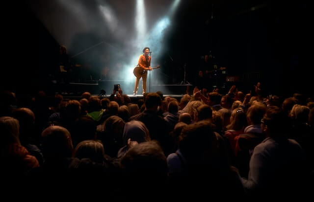 lady singing on a astage