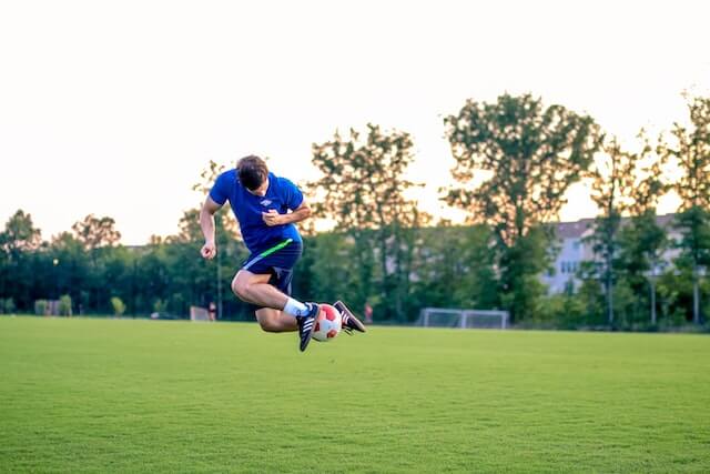 Footballer playing with a ball