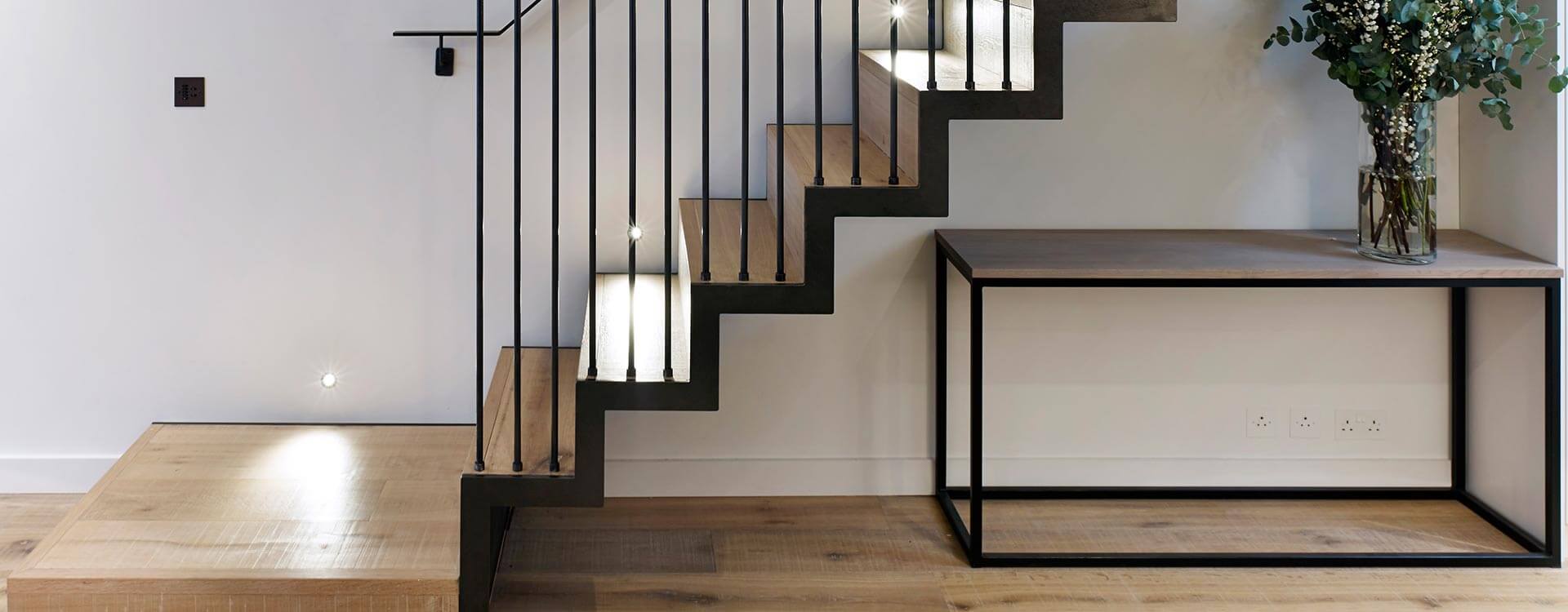 Wooden stairs with metal railling