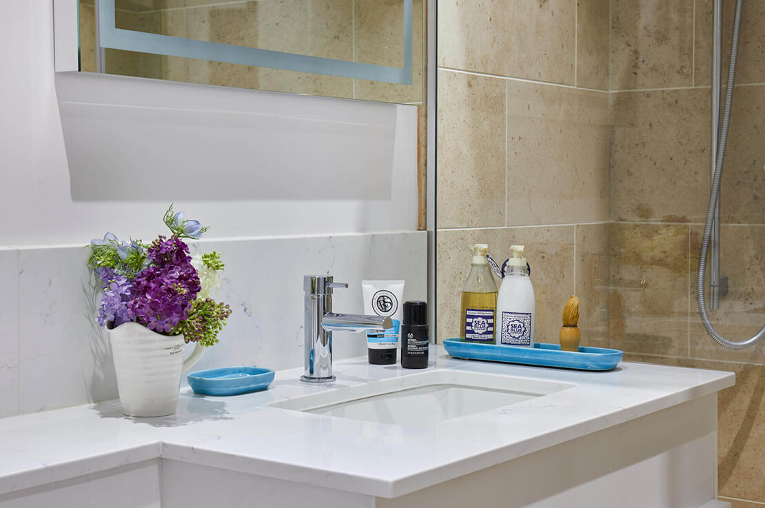 inbuilt bathroom sink with silver tap