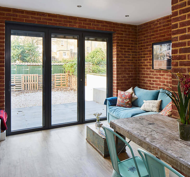 rear extension with folding doors and dining table