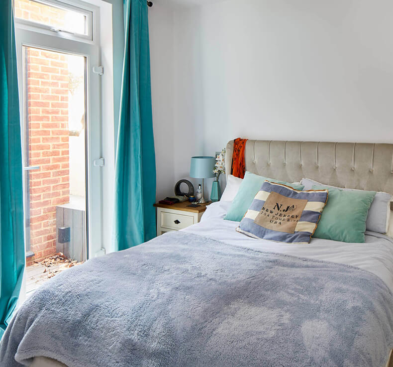 bed with grey beddings