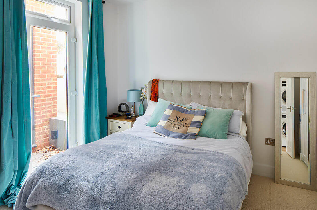 bed with grey beddings