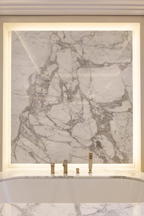 marble bathroom sink with gold faucets