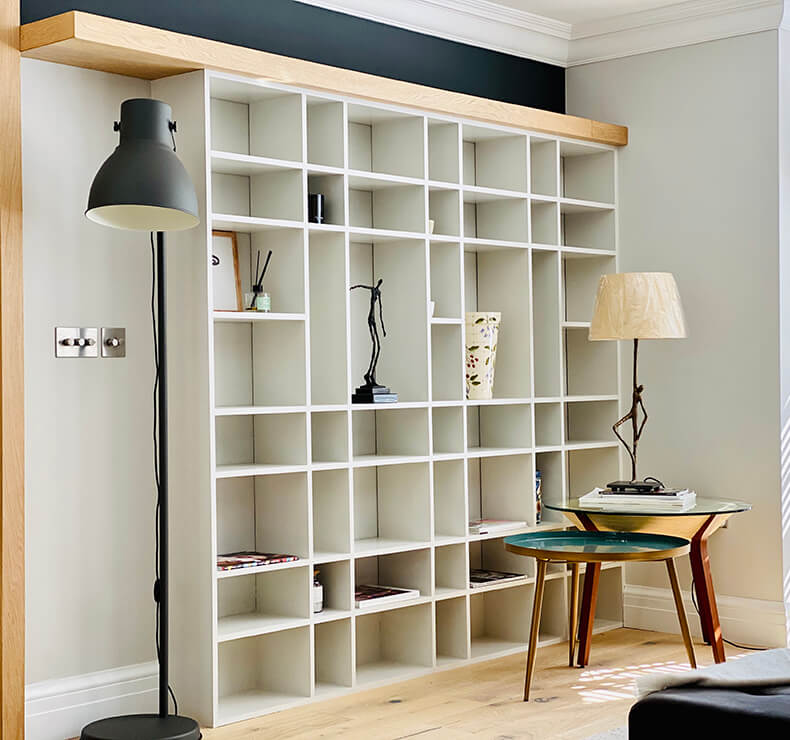 simple modern white display case and large floor lamp