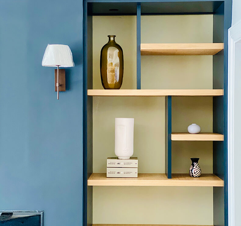 built-in wooden and dark blue display case