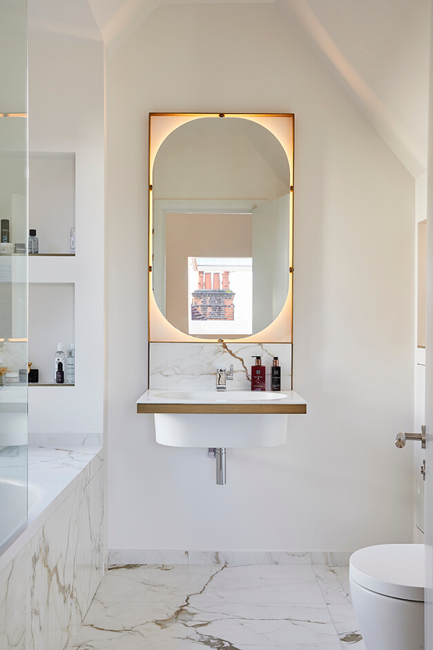 modern white bathroom with sink and LED mirror