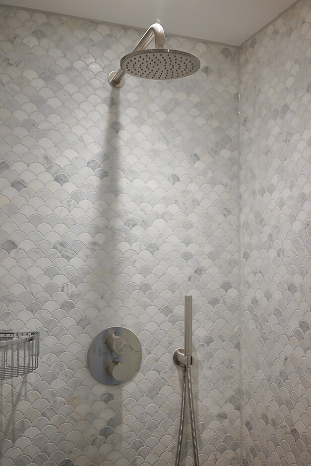 modern grey and white tiles shower with fixed shower head