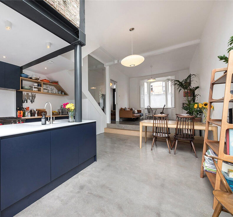 open plan kitchen in Holloway, lounge and dining area with wooden table