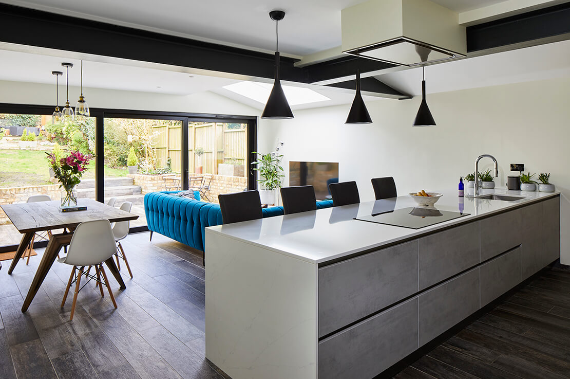 kitchen dining room extension with tv and sofa