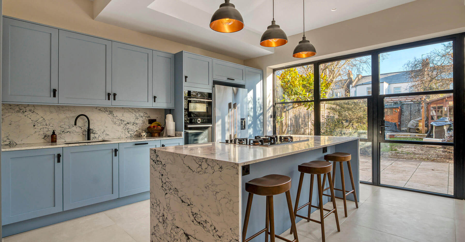 kitchen island with stove top and bar stool seating