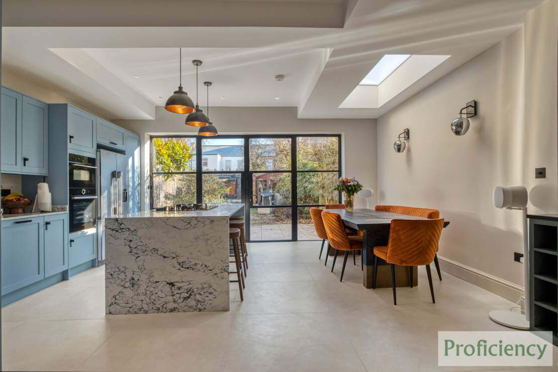 open concept kitchen with island and living room