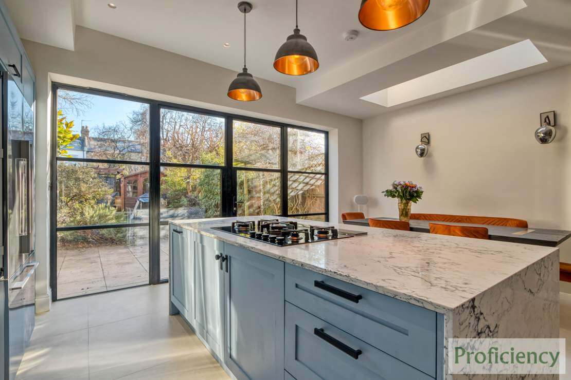 kitchen island with waterfall countertop