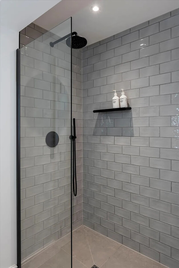 shower with grey tiles
