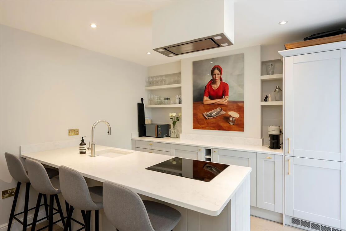 white kitchen with gray modern bar stools