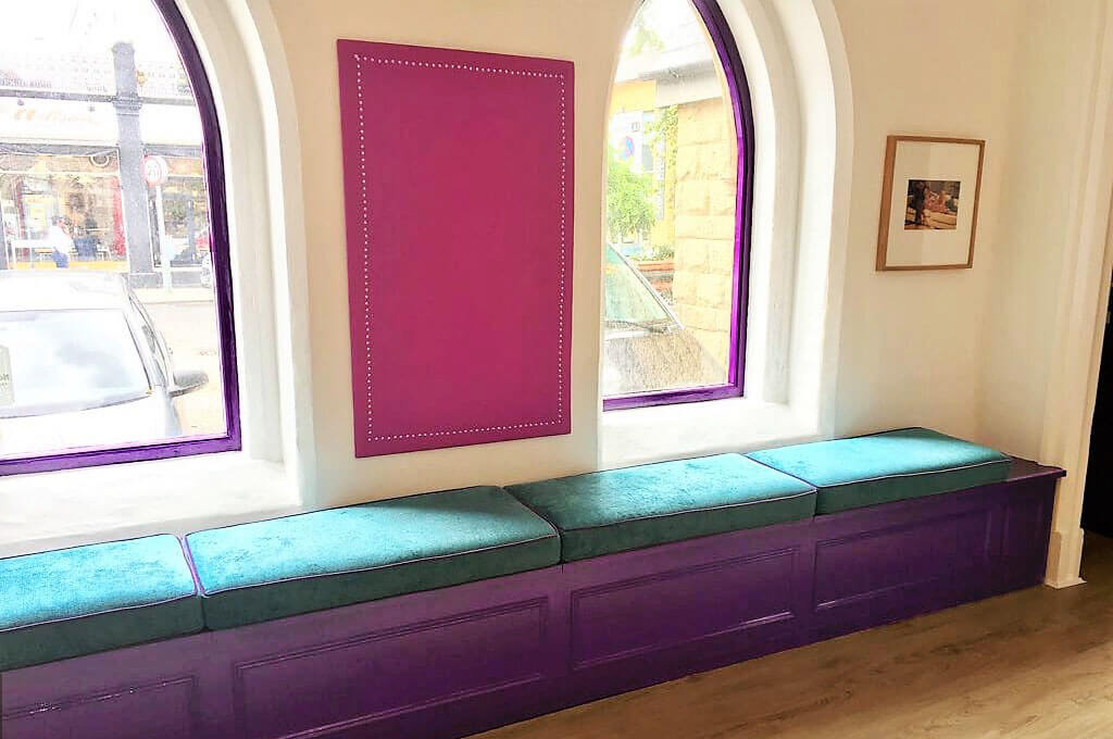 window nook with pointed arch windows with outside view