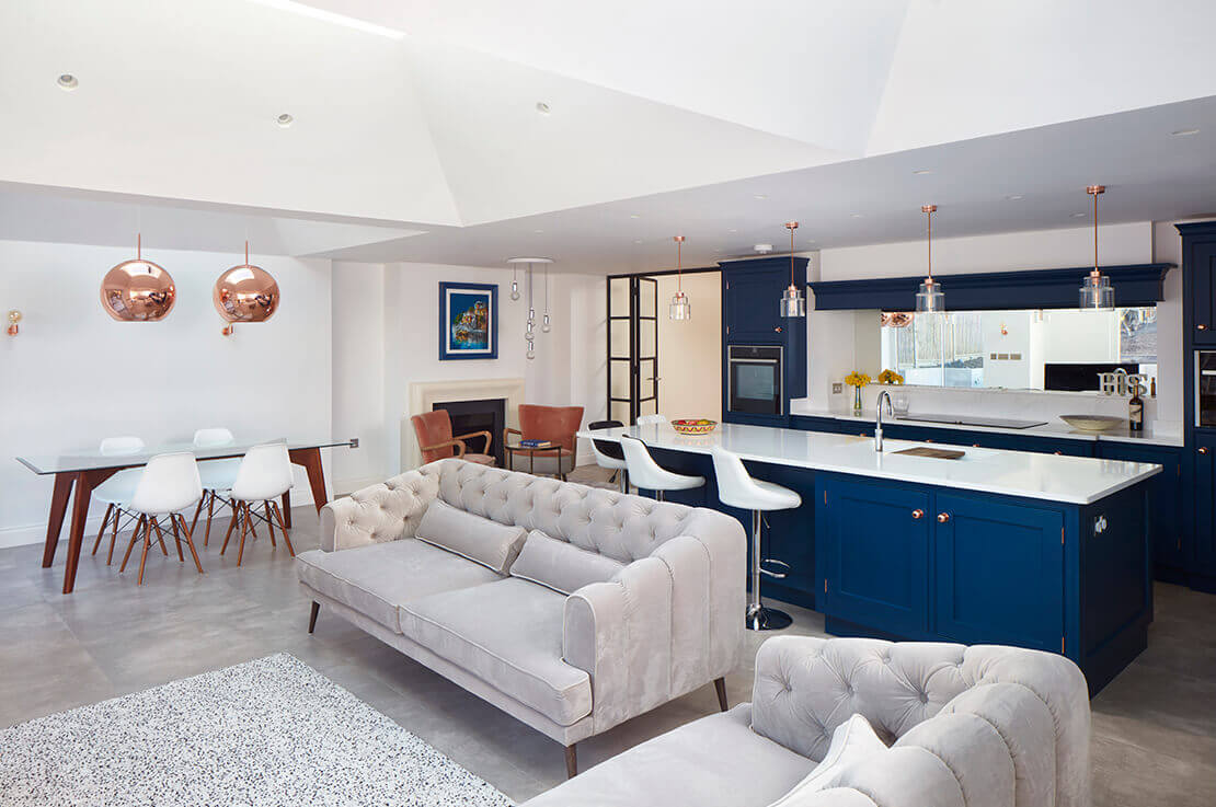 open plan kitchen with island and bar stools