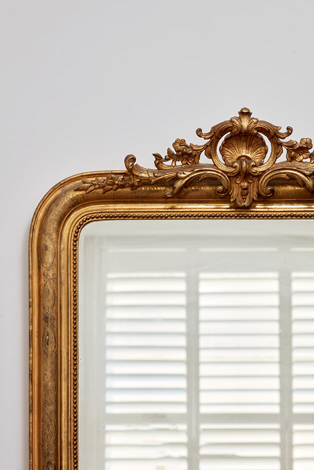 large bedroom mirror with golden frame