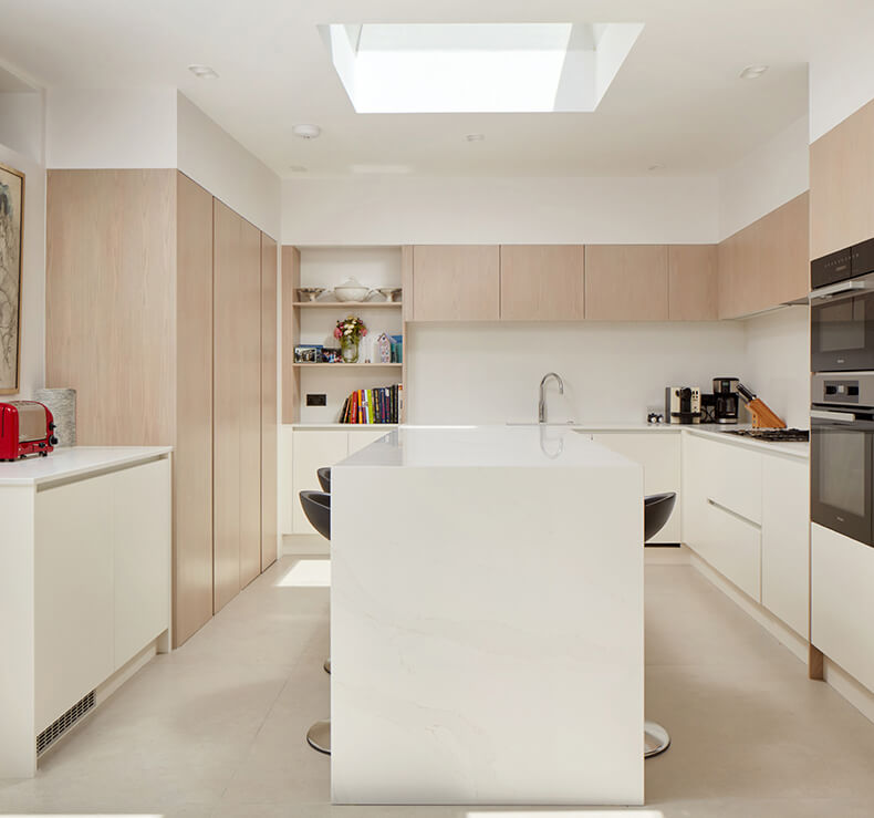 beige and white kitchen with island