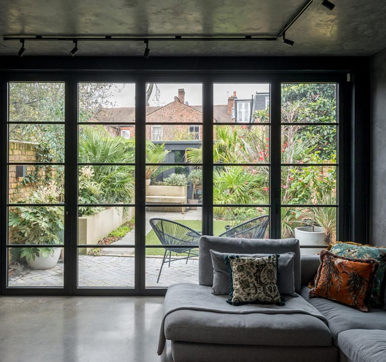 black bifold doors with square black panes and glass