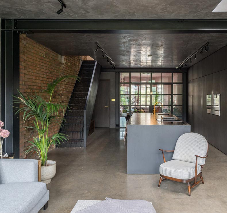 dark kitchen with straight stairs