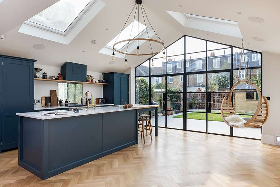 Blue navy rear single storey extension with black framed bi-fold doors